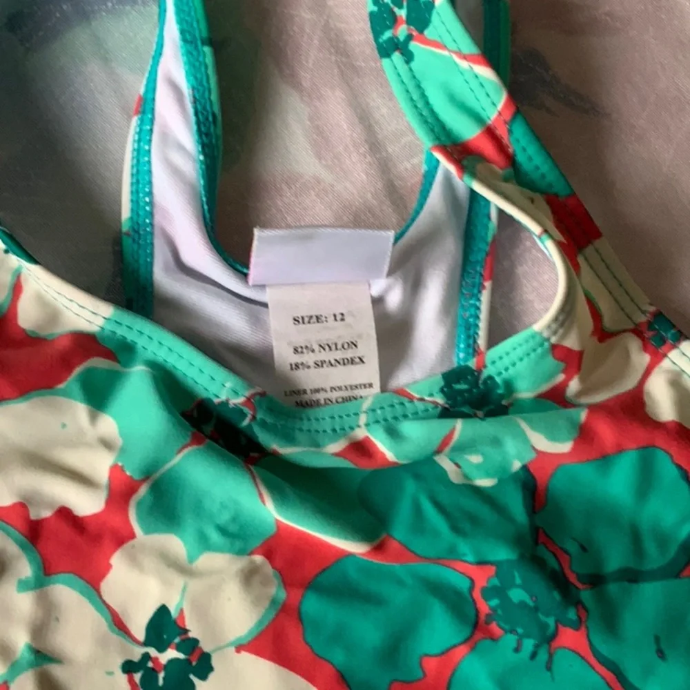 Kanu Surf girls floral swimsuit that fits size 10
